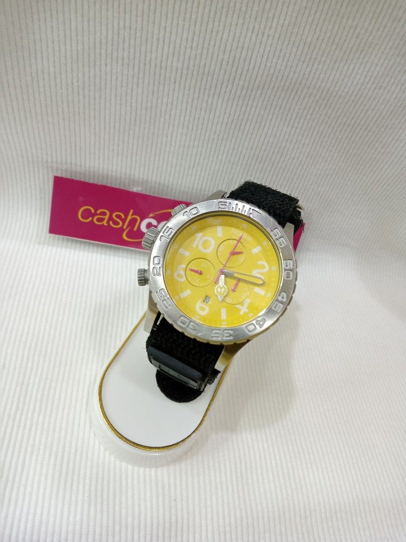 Nixon 46 gold cheap