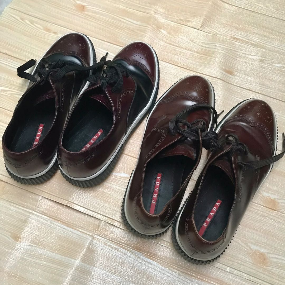 Prada Leather Sneakers (Category: Casual Shoes) located in Opol. Submitted by ebeau_closetph (Listing ID 1244250510, Image 2). Description: Selling my Cousin-in laws Well-loved shoes❗️ A. Prada 4E3070 2-tone Calf Leather~ Cordovan+Black Size 10 (around 28cm insole) Excellent to Likenew Condition Minimal crease only B. Prada 4E3069 Stratus Sneakers~Brown Leather Size 10 (around 28cm insole) Excellent to likenew Minimal crease only. ✔️No box & No s