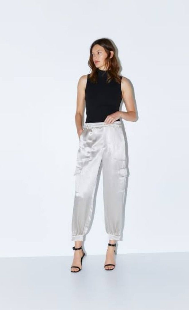 Zara Satin Cargo Pants (Category: Other Bottoms) located in Caloocan City. Submitted by val02 (Listing ID 1244110761, Image 3). Description: impulsive buyer, na stored lang sa closet size large in tag, garterized, can stretch up to 33 inches.