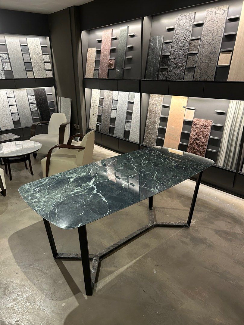 Dining Table (Category: Tables & Sets) located in Singapore. Submitted by tikongkia90 (Listing ID 1244450636, Image 1). Description: Italian sintered stone top Matt black powder coated steel base 1800 x 900 Comfortably sits up to 6 Brand New! Include delivery Sorry best price already no nego .