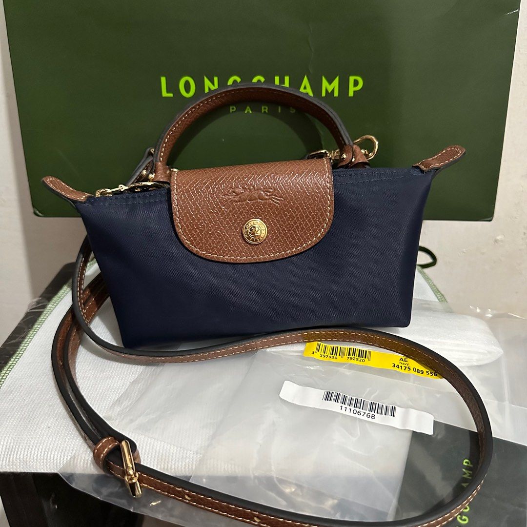 longchamp mini pouch with sling, Luxury, Bags & Wallets on Carousell