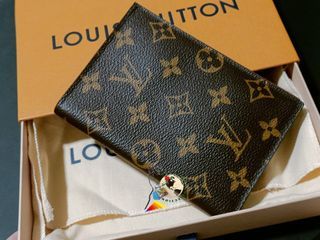Louis Vuitton uses RFID for #inventory? Found this in my LV wallet. Anyone  know more? #rfid 