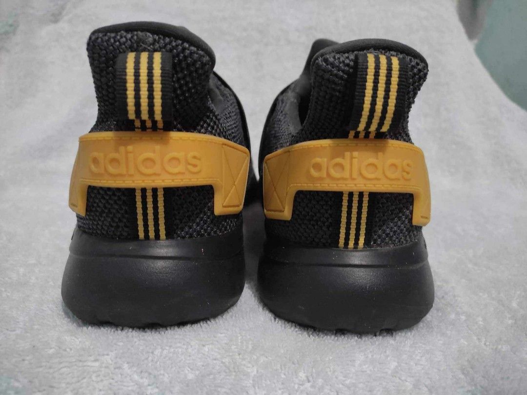 Adidas tubular on sale black and gold