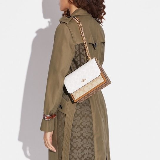 Turnlock chain phone crossbody hotsell in blocked signature canvas