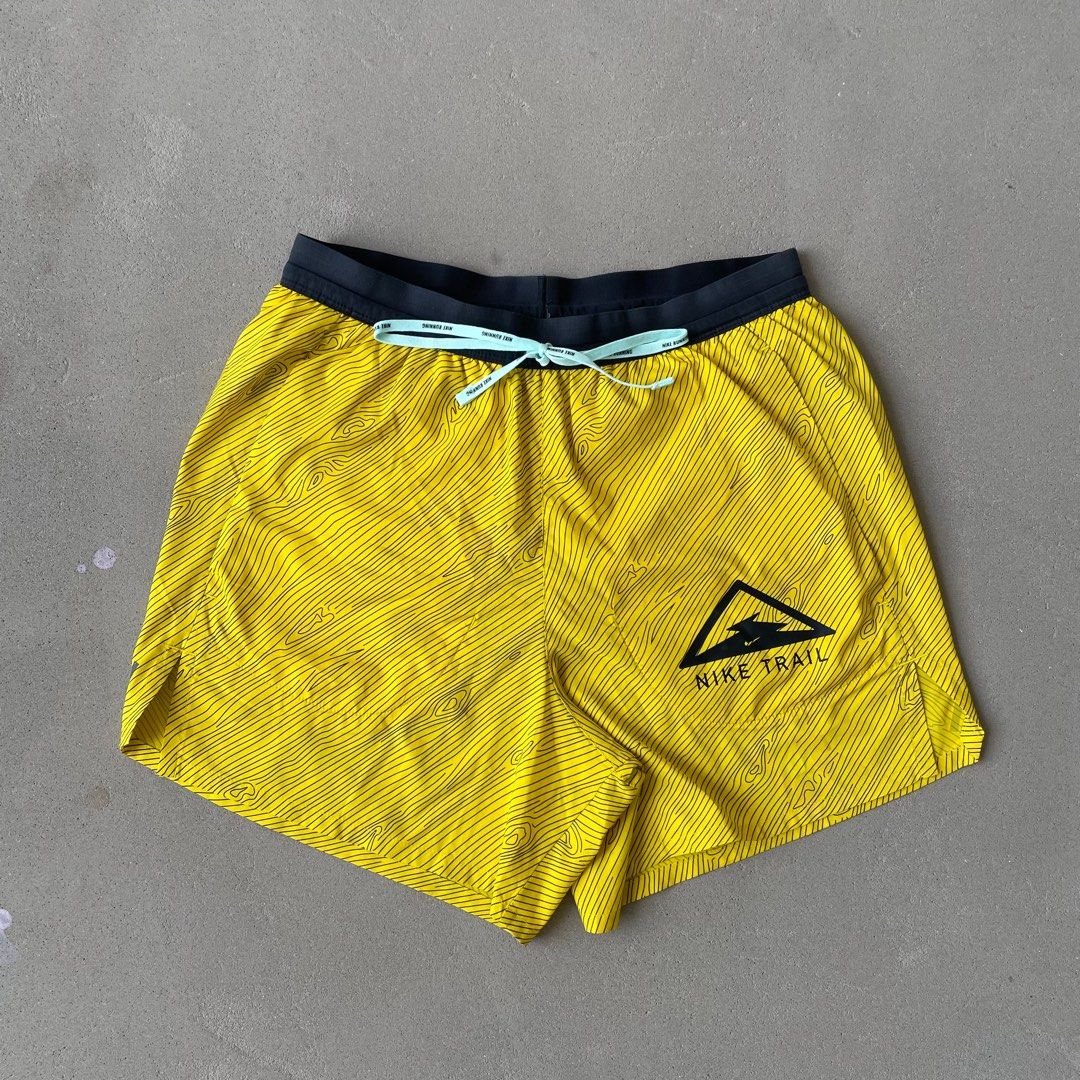 Nike trail on sale shorts yellow