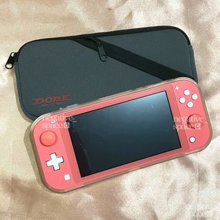 Nintendo Switch Lite Coral +  Hard Case + Pouch