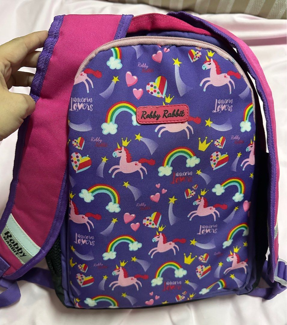 Robby Rabbit School Bag and Lunch Bag (Category: Babies & Kids Fashion) located in Mandaluyong City. Submitted by divine_greyz (Listing ID 1244435434, Image 2). Description: School and lunch bag of my daughter when she was in grade one. • School bag - 2 main compartments, back to back. Pink and purple. Sign of used lang po. • Lunch bag - almost new. Hindi sya masyado nagamit Can be sold separately .