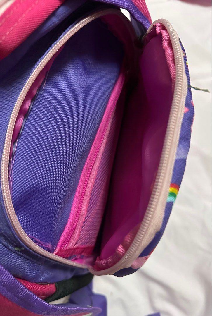 Robby Rabbit School Bag and Lunch Bag (Category: Babies & Kids Fashion) located in Mandaluyong City. Submitted by divine_greyz (Listing ID 1244435434, Image 3). Description: School and lunch bag of my daughter when she was in grade one. • School bag - 2 main compartments, back to back. Pink and purple. Sign of used lang po. • Lunch bag - almost new. Hindi sya masyado nagamit Can be sold separately .