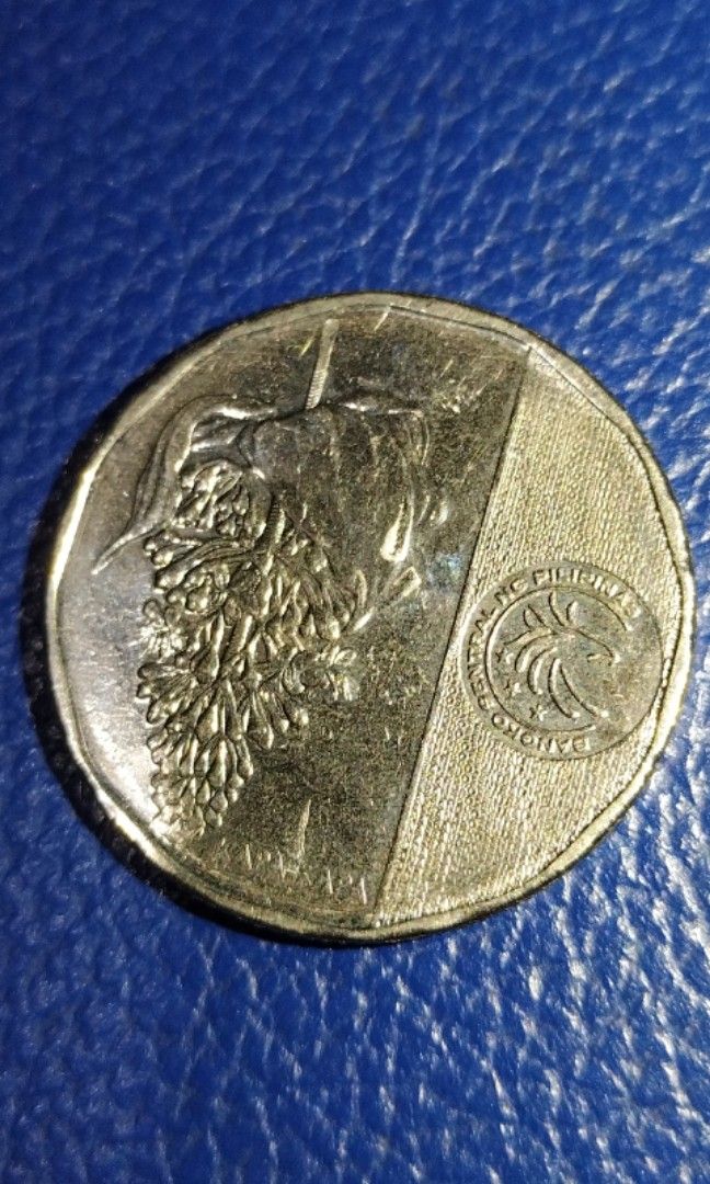 Apolinario Mabini 10 Peso Error Coin (Category: Currency) located in Caloocan City. Submitted by all_antiques_preloved (Listing ID 1244554552, Image 3). Description: ☑️ Reverse side of coin has Excess metal as seen in the first picture. ☑️ Can still provide photos upon request po.😊 P.S. Please check out my page here sa Carousell❤️ thank y'all! ❤️ ❇️ Lahat po ng ANTIQUE/VINTAGE ITEMS dito ay from our lola's & some from our great grandparents pa p