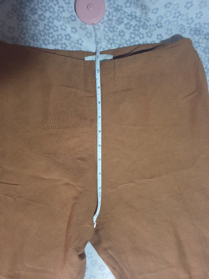 Araw Pants (Category: Other Bottoms) located in Davao. Submitted by anna.mata (Listing ID 1244463376, Image 3). Description: PLS READ! Brought from their sample sale. Selling low because of minor flaw. (1) Loose stitches at the front. Should be fixable (2) Minor pilling. Not noticeable when worn Material is linen blend. Pls. see photos for measurements. Selling cause I gained weight. No longer fits me na 🥲.