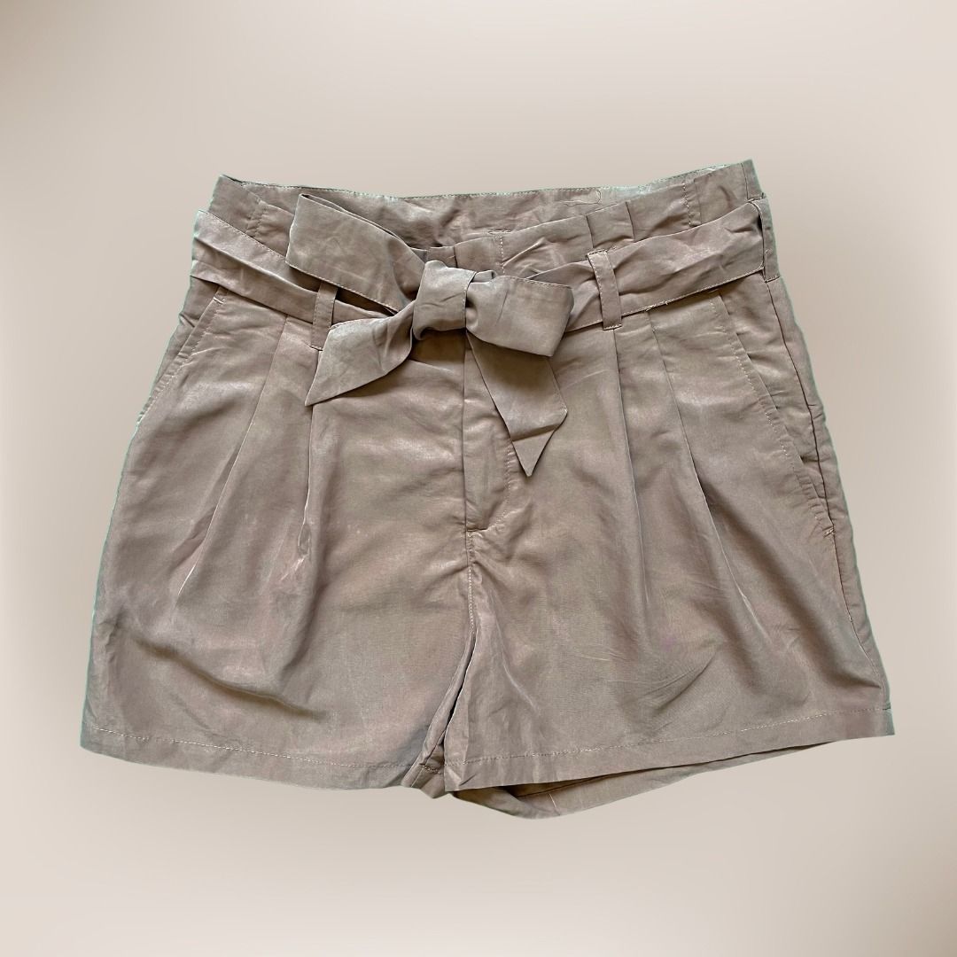 H&M Tan Ribbon Shorts (Category: Shorts) located in Quezon City. Submitted by aces_ (Listing ID 1244522304, Image 1). Description: Never used Has ribbon belt Fits 27-28.