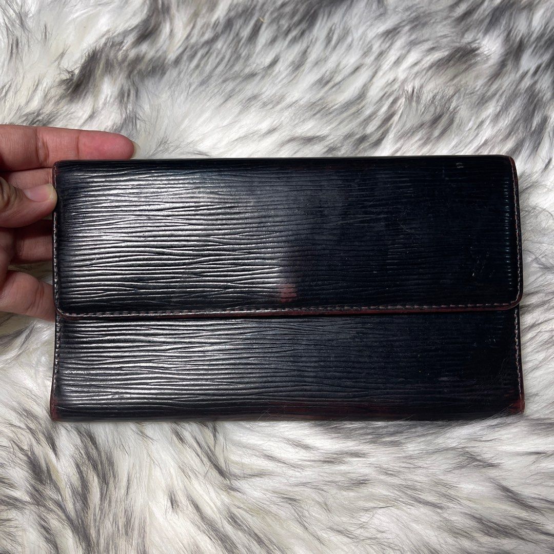 LV embossed long wallet, Luxury, Bags & Wallets on Carousell