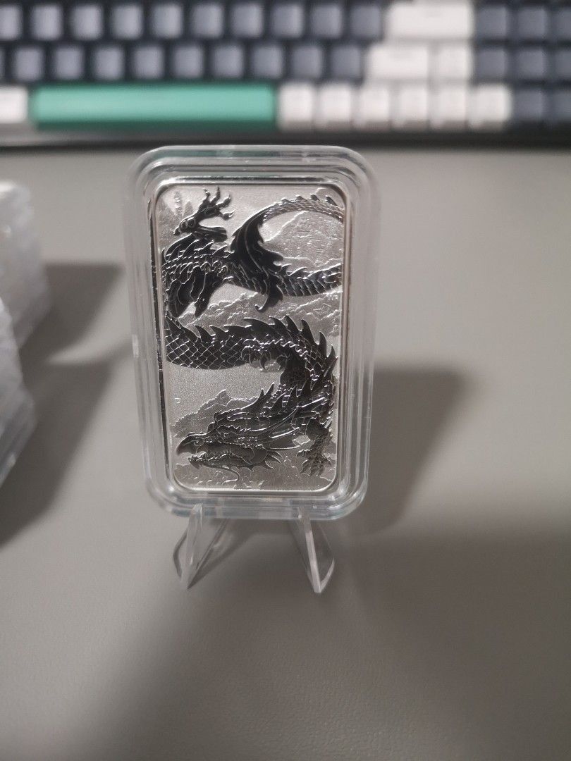 Capsuled Perth Mint Dragon 2023 1oz 999 Silver Bullion Bar (Category: Currency) located in Singapore. Submitted by bullionex (Listing ID 1244601233, Image 3). Description: Brand new Perth Mint Dragon 2023 Silver Bullion Bar 1oz - 1 to 4 pieces = SGD49.00 per pc - 5 pieces and more = SGD48.50 per pc - 10 pieces and more = SGD48.00 per pc - Brand new and guarantee no milk spot and scratch. - Products imported from origin country - REMARK: All piece
