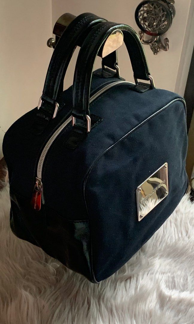 Trussardi Jeans handbag (Category: Luxury Bags & Wallets) located in Malolos. Submitted by flapnbloom.ph (Listing ID 1244641779, Image 1). Description: Rare Trussardi Jean box typed handbag MOP: Bank transfer/GCash Pm for inquiries.