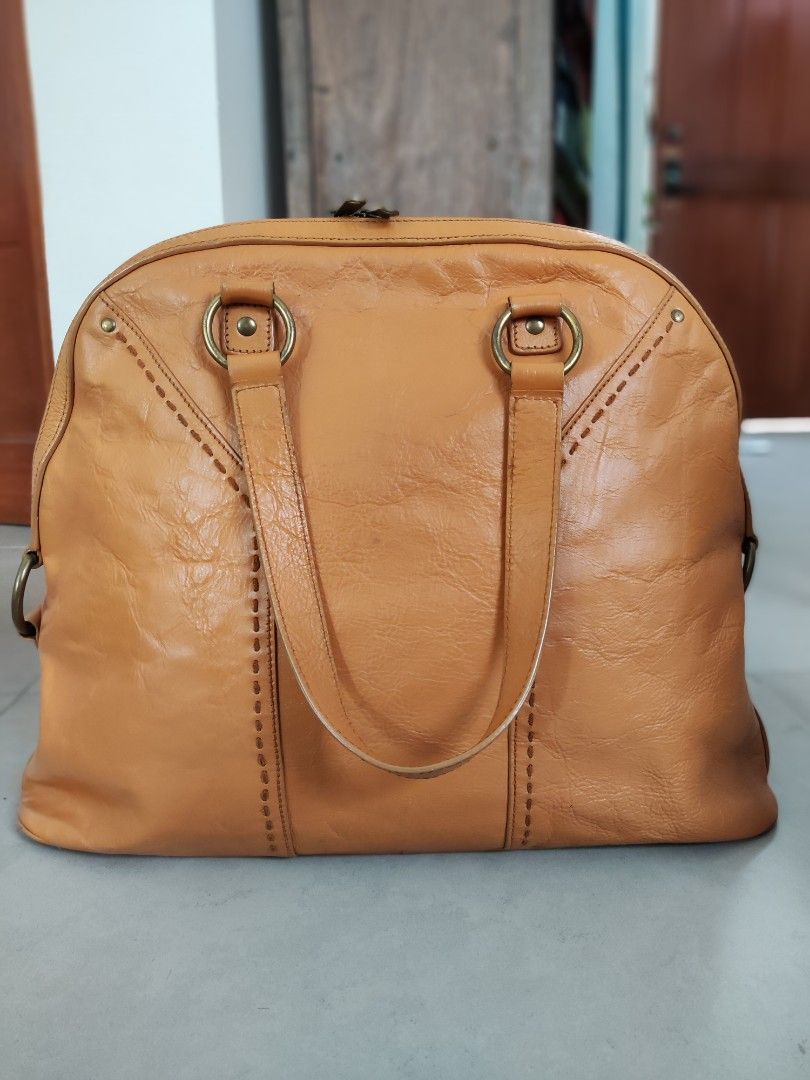 YSL Muse Large aka Oversized (Category: Luxury Bags & Wallets) located in Mandaluyong City. Submitted by deedeiadeng (Listing ID 1244517632, Image 2). Description: Authentic Oversized YSL Muse Color Revived by BagRx, regularly cleaned and conditioned Interior has also been cleaned Signs of wear on the straps With padlock and keys (within clochet), original dustbag and free bag pillow. Negotiable! RFS - too many large sized bags.