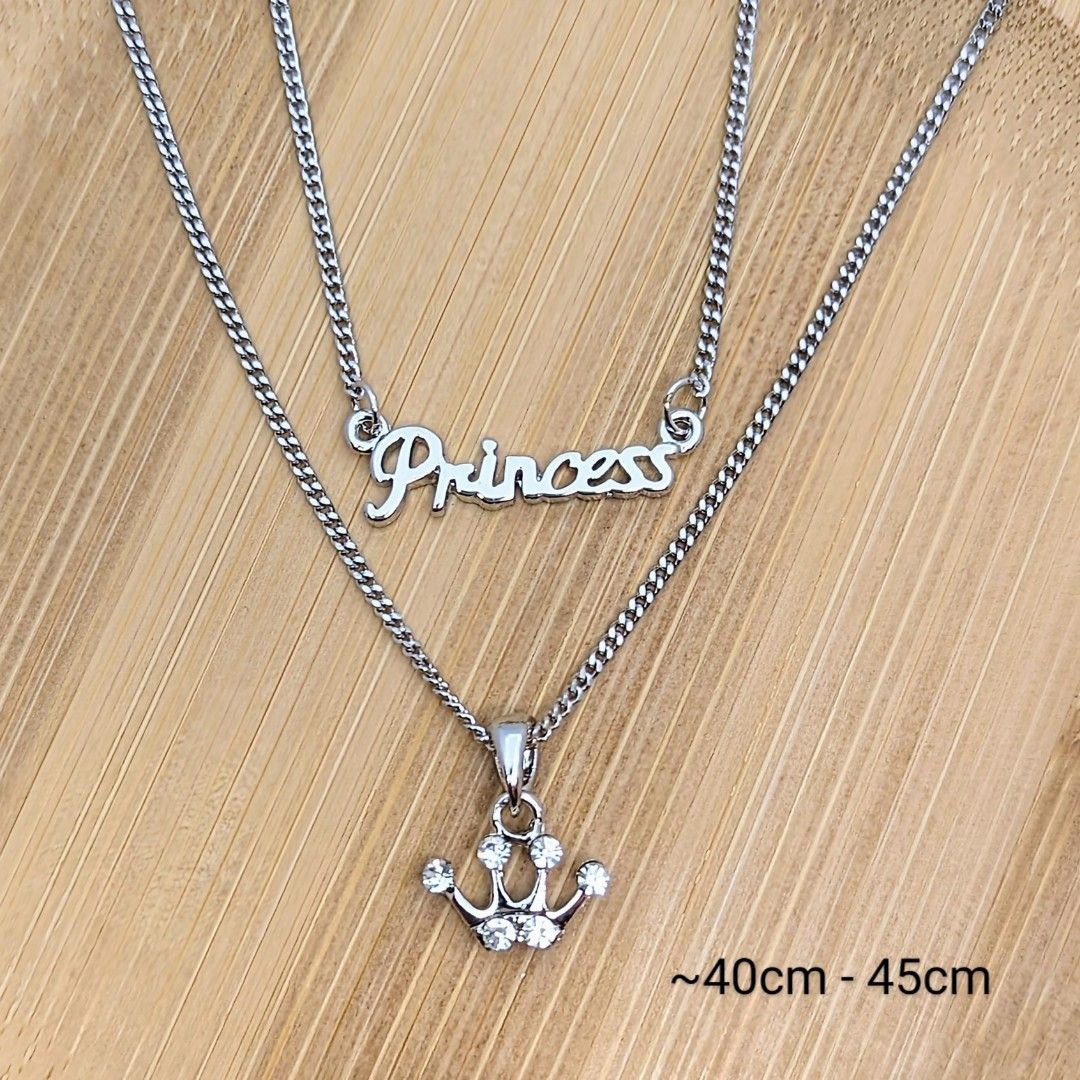 Gold necklace that says cheap princess