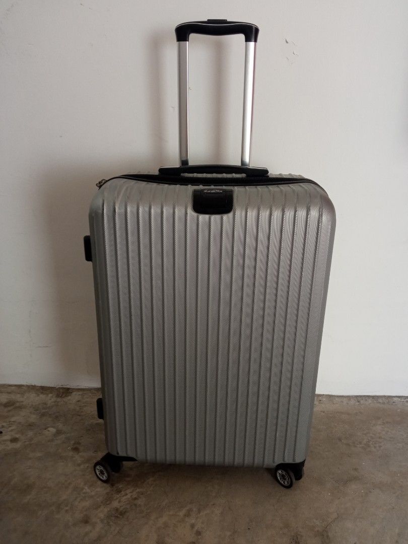 Arnold Palmer 24 inch 4 all direction wheels luggage