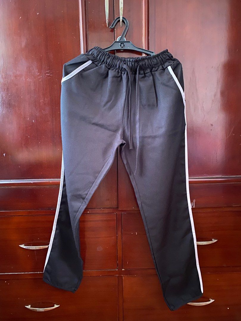Black joggers (Category: Other Bottoms) located in Manila. Submitted by drlsaldi (Listing ID 1244846266, Image 1). Description: Free size With white lining design RFS: not my style anymore.