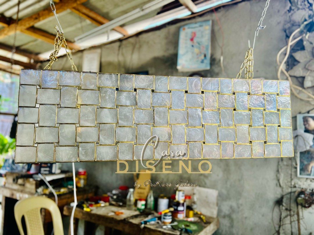 Capiz dining chandelier light (Category: Lighting) located in Caloocan City. Submitted by casadisenyo (Listing ID 1244662929, Image 2). Description: MADE TO ORDER CAPIZ DINING CHANDELIER size: 45" x 12" x 11" MESSAGE ME FOR FASTER TRANSACTION .