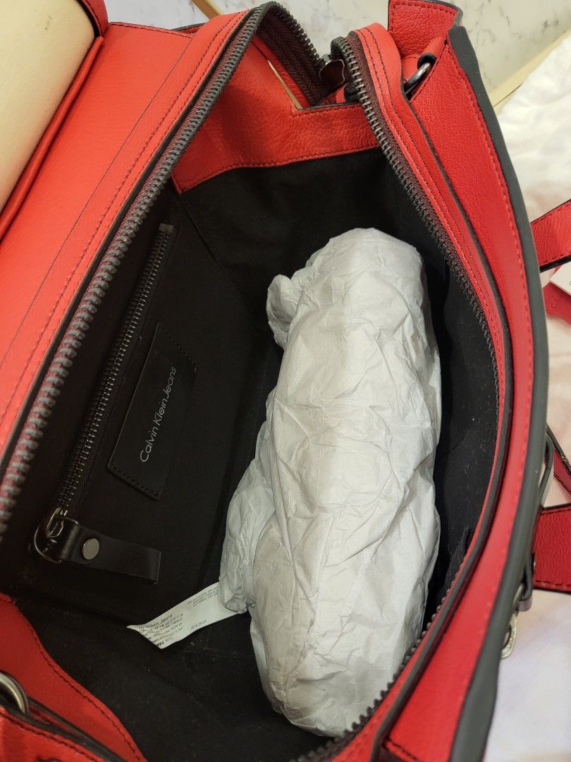 Calvin klein jeans red bag discount