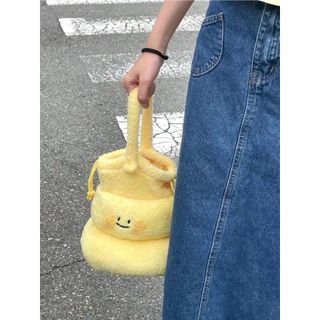 Cute yellow fluffy bag