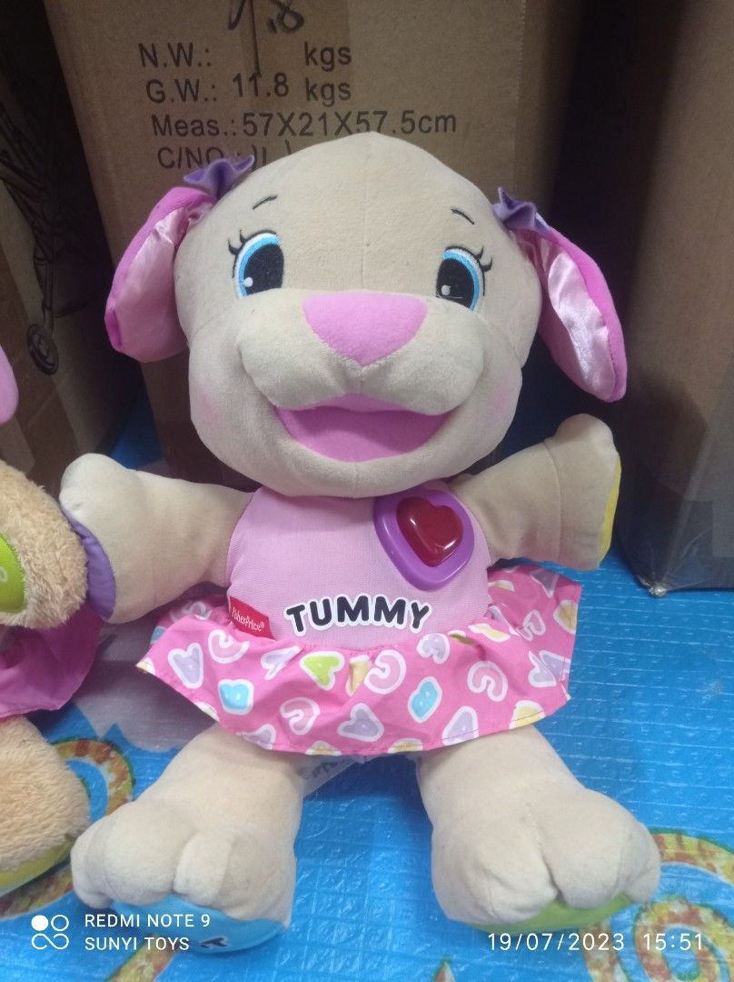 Fisher price laugh and learn to online dress puppy