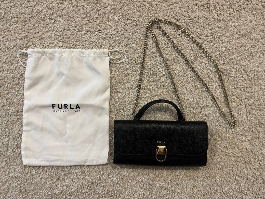 Furla Mini Wallet Cross Body Bag (Category: Luxury Bags & Wallets) located in Taguig. Submitted by ellejay8 (Listing ID 1244661563, Image 1). Description: minor scratch (see last photo) complete with dustbag RFS - decluttering.