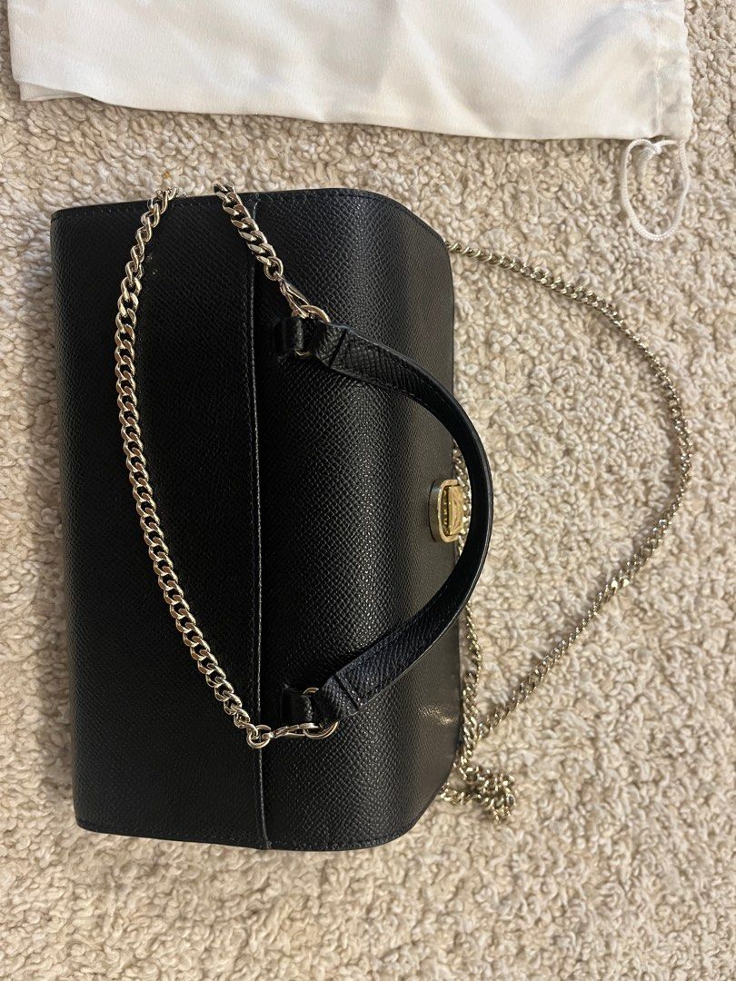Furla Mini Wallet Cross Body Bag (Category: Luxury Bags & Wallets) located in Taguig. Submitted by ellejay8 (Listing ID 1244661563, Image 3). Description: minor scratch (see last photo) complete with dustbag RFS - decluttering.
