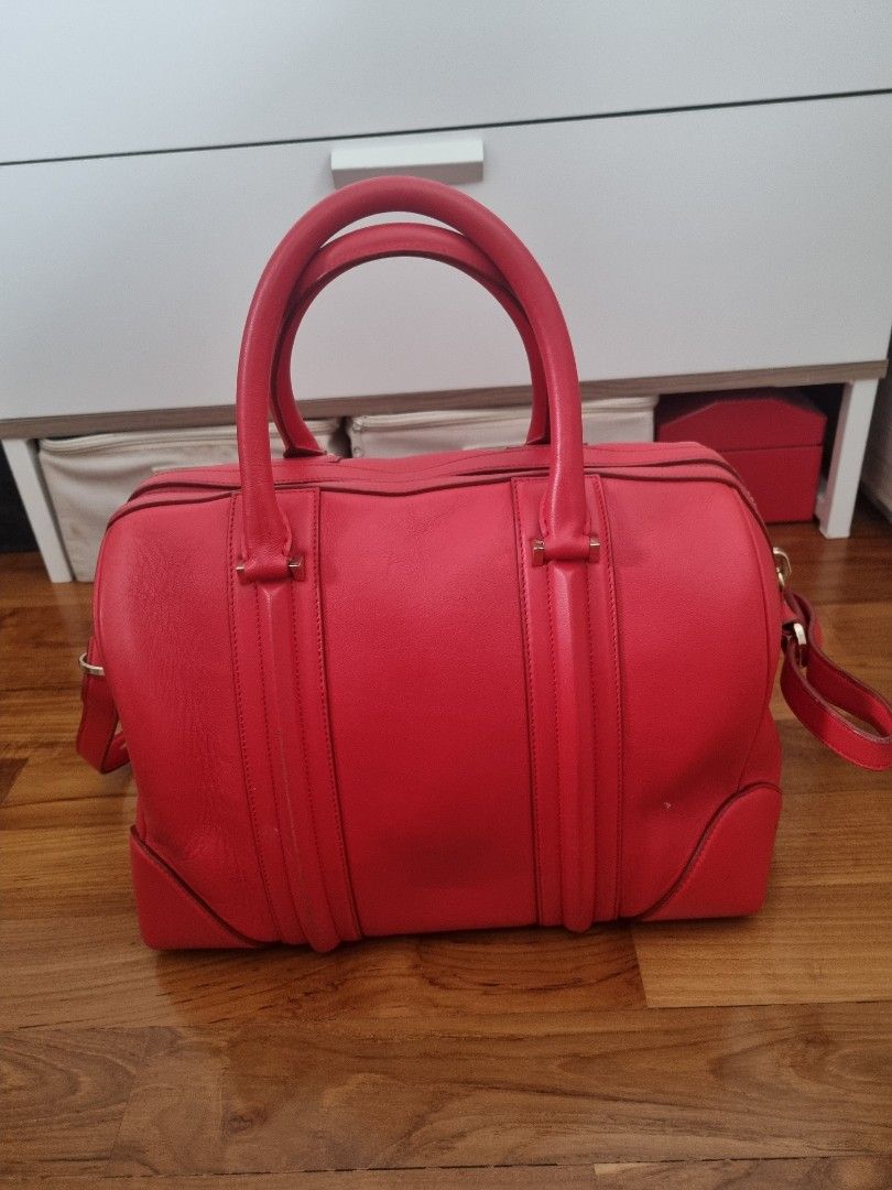 Red leather duffle top bag