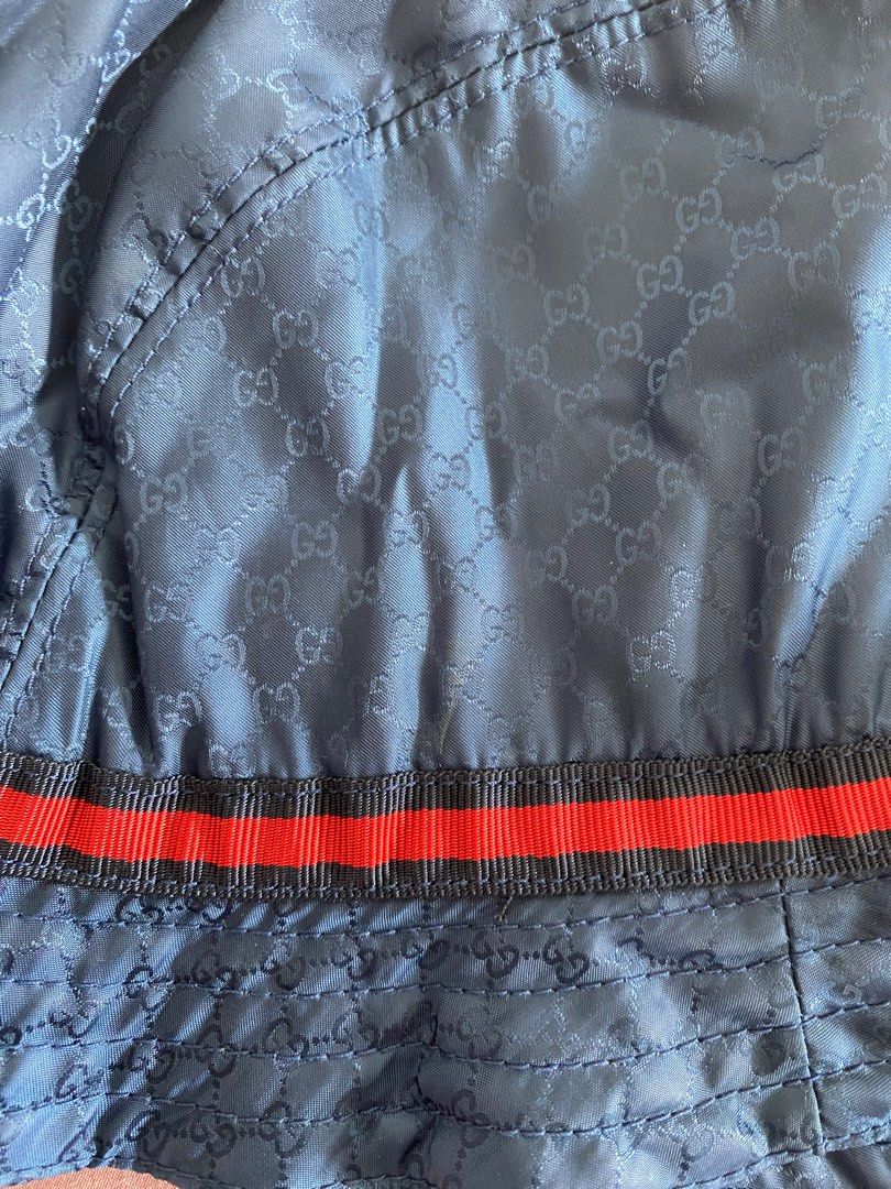 Gucci Kids Blue Bucket Hat (Category: Babies & Kids Fashion) located in San Juan City. Submitted by 11_mallow (Listing ID 1244702209, Image 2). Description: Gucci Kids Blue Bucket Hat GG Print Navy/red web print Size: L Very good condition Refer to photo for measurement Pick-up c/o buyer only RFS: Outgrown.