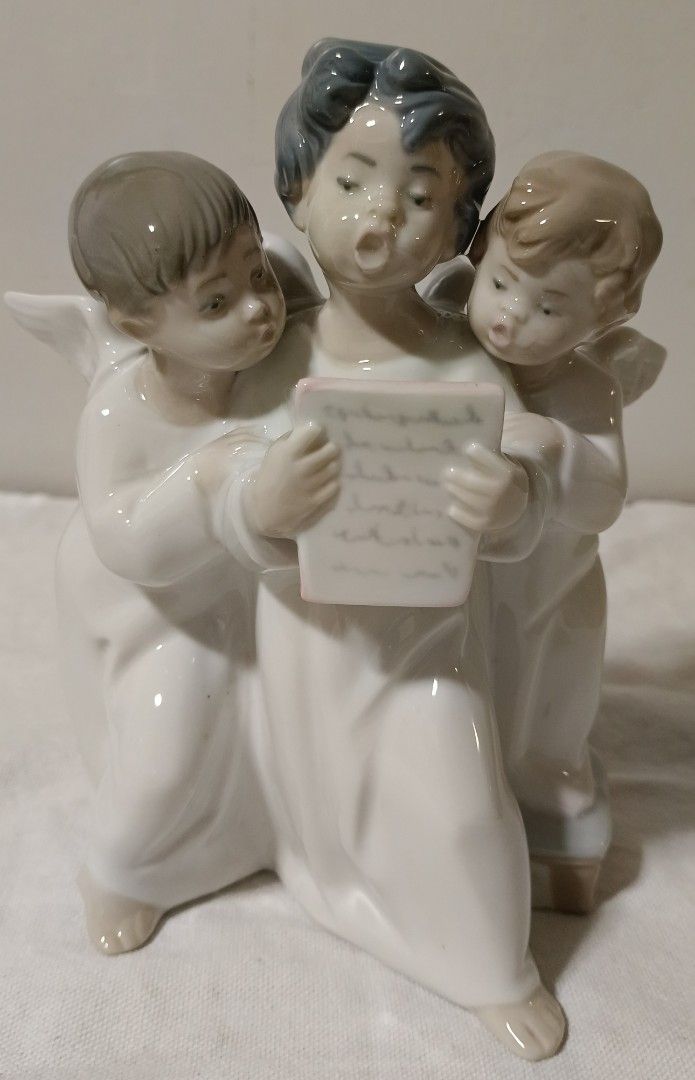 LLADRÓ ANGELS GROUP (Category: Figurines & Statues) located in Quezon City. Submitted by iganda (Listing ID 1244774715, Image 1). Description: ORIGINAL LLADRÓ ANGELS GROUP. LIKE NEW. NO FLAWS. PORCELAIN..