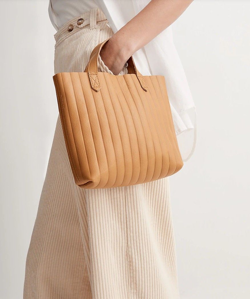 Madewell Mini Transport Crossbody (Category: Cross-body Bags) located in Manila. Submitted by goods4all (Listing ID 1244823432, Image 2). Description: A mini edition to the best-selling Transport team in a convenient smaller size that's perfect for a tablet or e-reader (and all your other essentials). Leather. Zip closure. 17 3/4" strap drop, 3 1/2" handle drop. 10 7/8"H x 10 1/4"W x 3 1/2"D..