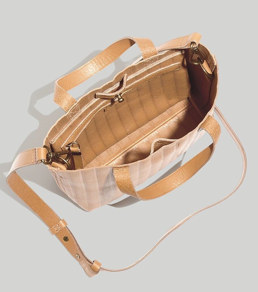 Madewell Mini Transport Crossbody (Category: Cross-body Bags) located in Manila. Submitted by goods4all (Listing ID 1244823432, Image 3). Description: A mini edition to the best-selling Transport team in a convenient smaller size that's perfect for a tablet or e-reader (and all your other essentials). Leather. Zip closure. 17 3/4" strap drop, 3 1/2" handle drop. 10 7/8"H x 10 1/4"W x 3 1/2"D..