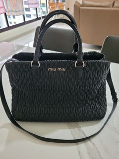 Miu miu mini bow bag, Luxury, Bags & Wallets on Carousell