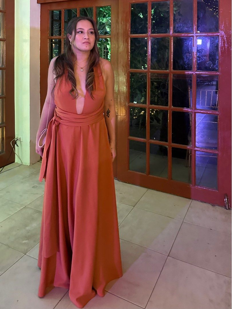 Rust Color Infinity Dress (Category: Evening dresses & gowns) located in Mandaluyong City. Submitted by needmoreclxsetspace (Listing ID 1244679123, Image 1). Description: Custom Infinity Dress - Thick polyester material (not the usual thin, stretchy nylon cotton cloth) - extra long ties - comes with inner tube (not used in photo) - Waist 30” but can stretch up to 32” or tied to tighten for smaller waist - Skirt length 44” - used once.