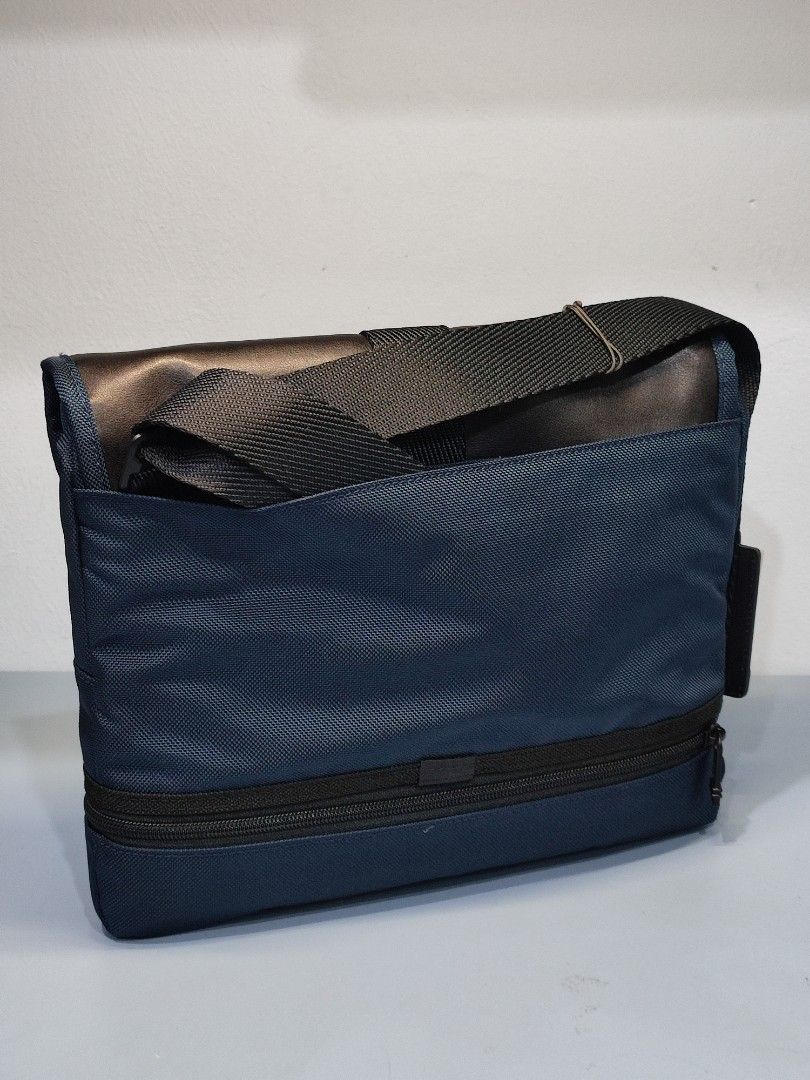 Tumi sales travis crossbody