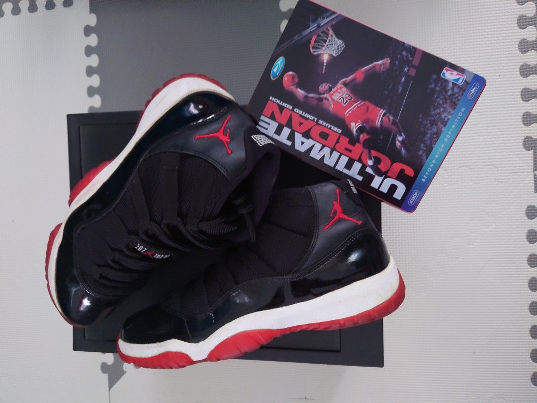 Air Jordan 11 - Breds (Category: Sneakers) located in Imus. Submitted by mark_zero8 (Listing ID 1244971822, Image 3). Description: Air Jordan 11 Breds Size 8.5 Issue: Old, slight sole sep. Good for display/collection. Without box but with original shoe tree plastic inserts. Will include plastic shoe box (black) Price: 10,000Php.