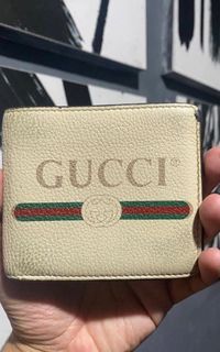 Authentic Gucci “Vintage Logo” Bifold Wallet