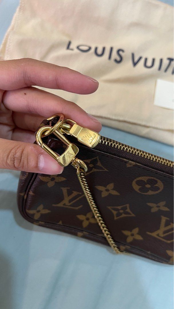 Authentic LV Mini Pochette (Category: Luxury Bags & Wallets) located in Bulacan. Submitted by glvzicbg_ (Listing ID 1244932844, Image 2). Description: 100% Authentic LV Mini Pochette With box and dust bag Like new Barely used Rfs: Declutter.
