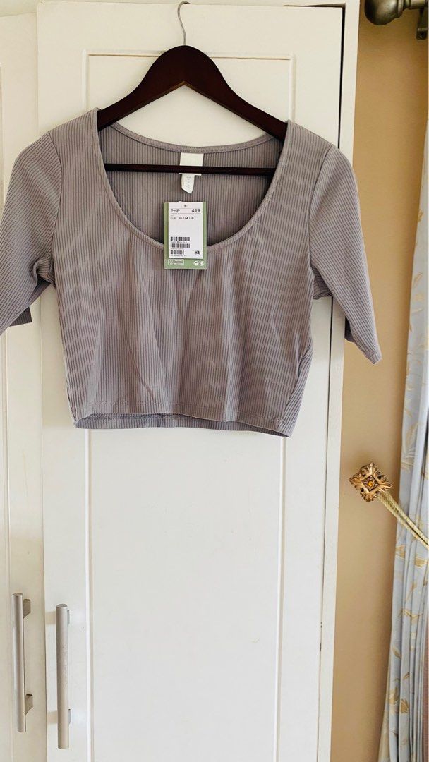 Brand New H& M top with tag (Category: Blouses) located in Bacoor. Submitted by mcyzon (Listing ID 1244930659, Image 1). Description: Brand new with tag.