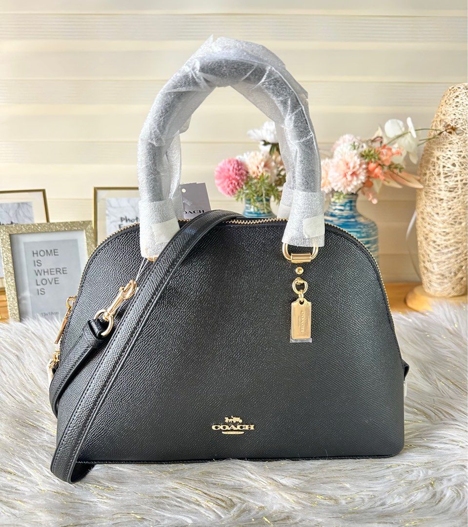 Coach Katy Satchel (Category: Luxury Bags & Wallets) located in Mandaluyong City. Submitted by shop_0n_the_spot (Listing ID 1244912701, Image 1). Description: 💯% GUARANTEED ORIGINAL & BRAND NEW. Katy Satchel Product Details: Crossgrain leather Inside zip pocket Zip closure, fabric lining Handles with 3 3/4” drop Outside zip pocket Detachable strap with 22” drop for shoulder or crossbody wear Four protective feet at base 11 3/4” (L) x 7 3/4” (H) 