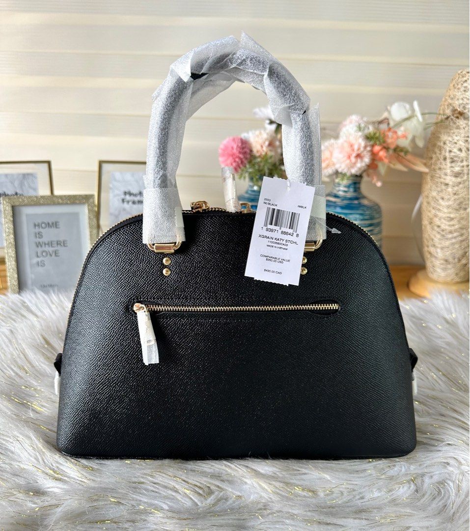 Coach Katy Satchel (Category: Luxury Bags & Wallets) located in Mandaluyong City. Submitted by shop_0n_the_spot (Listing ID 1244912701, Image 3). Description: 💯% GUARANTEED ORIGINAL & BRAND NEW. Katy Satchel Product Details: Crossgrain leather Inside zip pocket Zip closure, fabric lining Handles with 3 3/4” drop Outside zip pocket Detachable strap with 22” drop for shoulder or crossbody wear Four protective feet at base 11 3/4” (L) x 7 3/4” (H) 