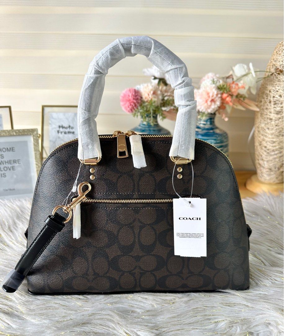 Coach Katy Satchel Mahogany (Category: Luxury Bags & Wallets) located in Mandaluyong City. Submitted by shop_0n_the_spot (Listing ID 1244912939, Image 3). Description: 💯% GUARANTEED ORIGINAL & BRAND NEW. Katy Satchel Product Details: Crossgrain leather Inside zip pocket Zip closure, fabric lining Handles with 3 3/4” drop Outside zip pocket Detachable strap with 22” drop for shoulder or crossbody wear Four protective feet at base 11 3/4” (L) x 7 