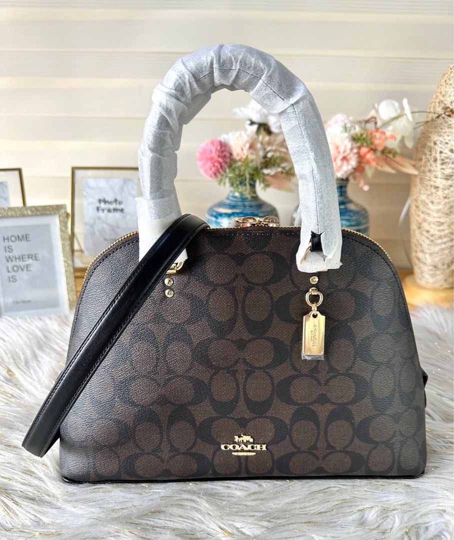 Coach Katy Satchel Mahogany (Category: Luxury Bags & Wallets) located in Mandaluyong City. Submitted by shop_0n_the_spot (Listing ID 1244912939, Image 2). Description: 💯% GUARANTEED ORIGINAL & BRAND NEW. Katy Satchel Product Details: Crossgrain leather Inside zip pocket Zip closure, fabric lining Handles with 3 3/4” drop Outside zip pocket Detachable strap with 22” drop for shoulder or crossbody wear Four protective feet at base 11 3/4” (L) x 7 