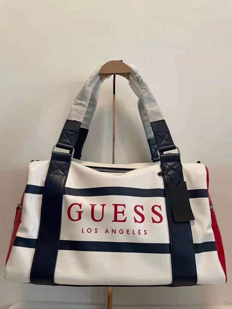 Guess travelling bag on Carousell