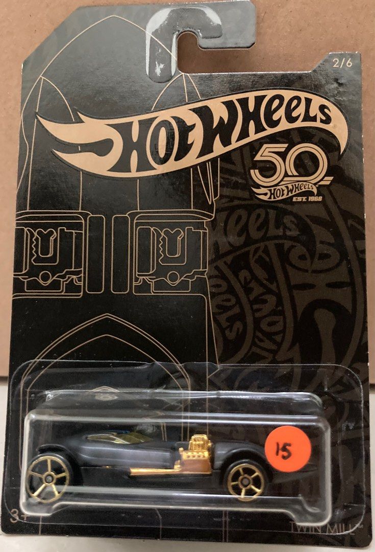 Hot wheels 50th anniversary black and gold bone shaker discount