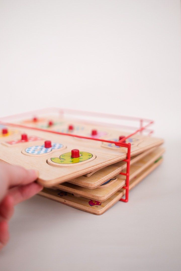 Knobbed puzzles with rack set on carousell