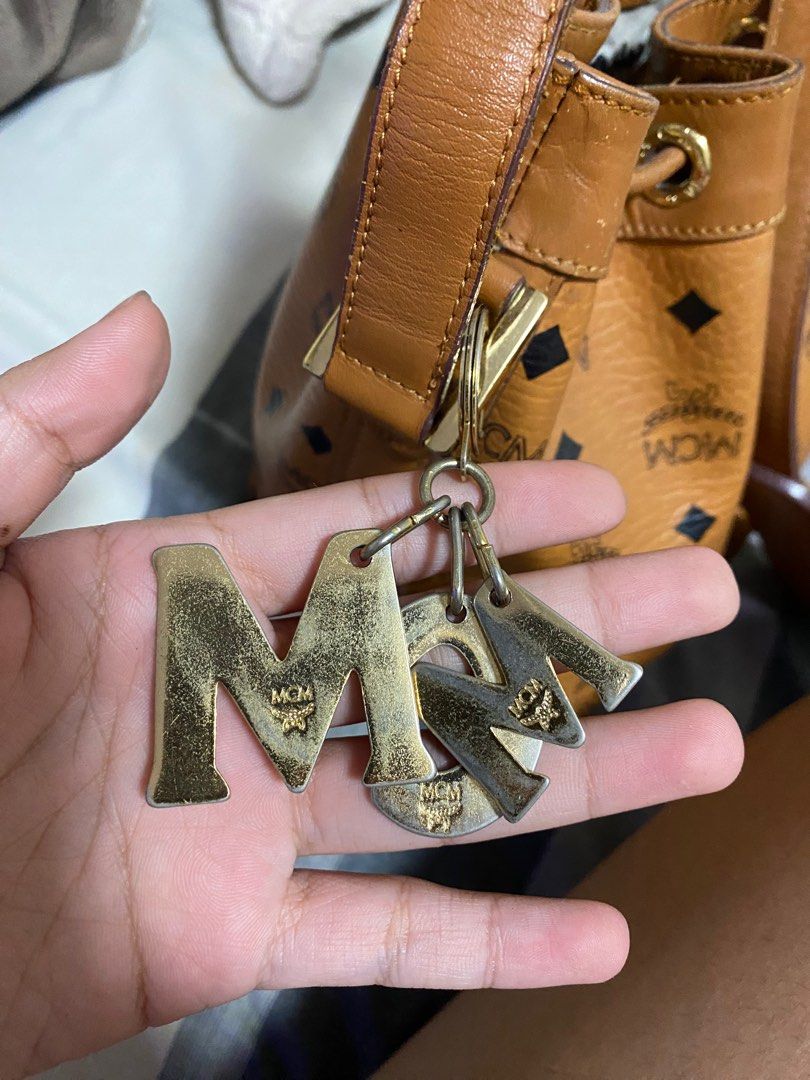 Mcm cognac bucket bag, Luxury, Bags & Wallets on Carousell