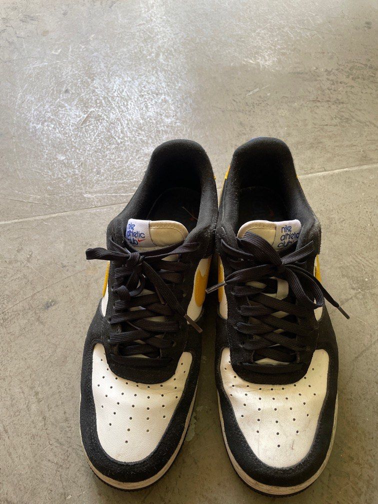 Nike air force 1 black yellow swoosh on sale