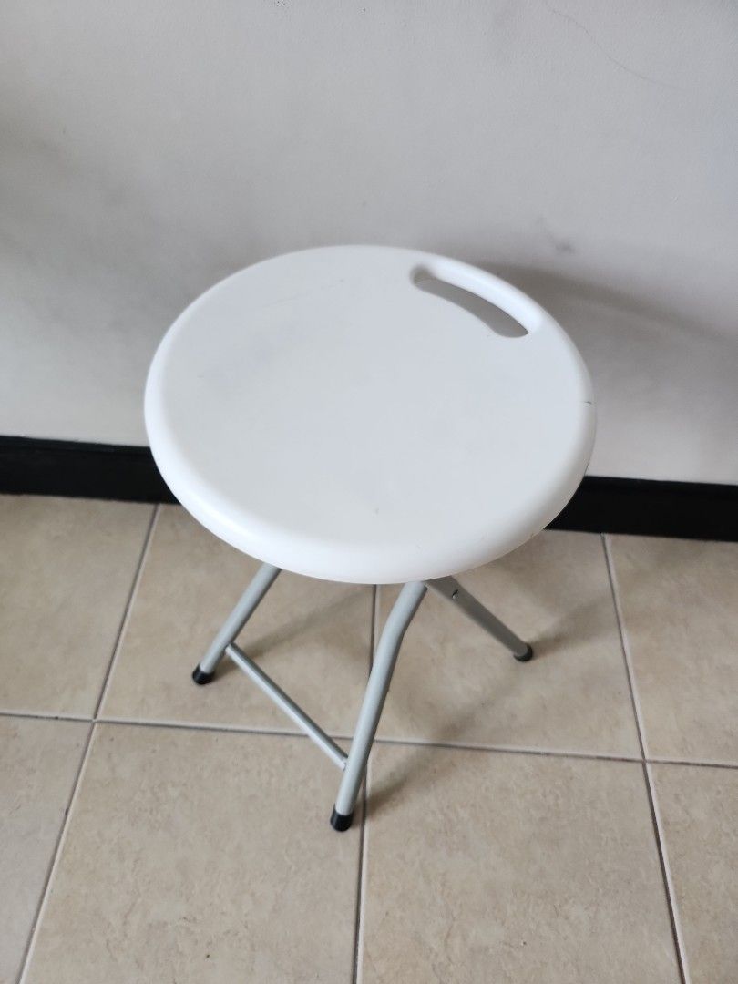 Portable white folding stool chair on Carousell
